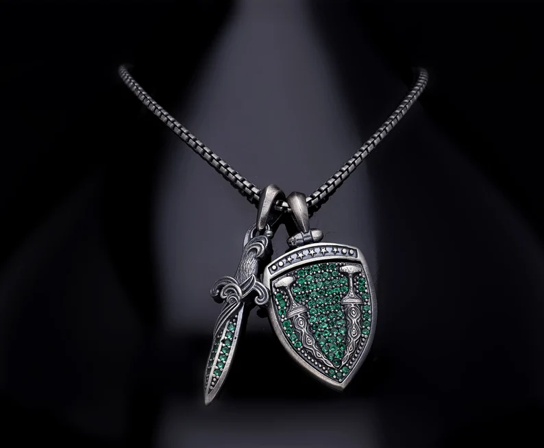 RARE PRINCE by CARAT SUTRA | Unique Designed Sword & Shield Silver Pendant With Green Zirconia Stone for Men | 925 Sterling Silver Oxidized Pendant | Men's Jewelry | With Certificate of Authenticity and 925 Hallmark